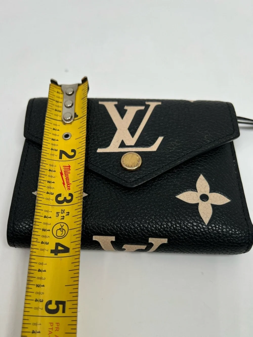 LOUIS VUITTON Portefeuille Victorine Monogram Bicolor Empreinte